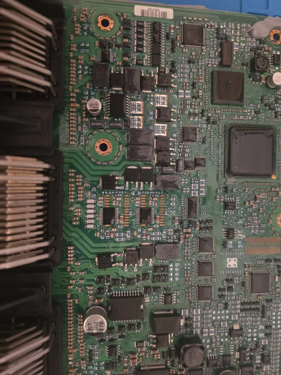 ECU circuit board being repaired